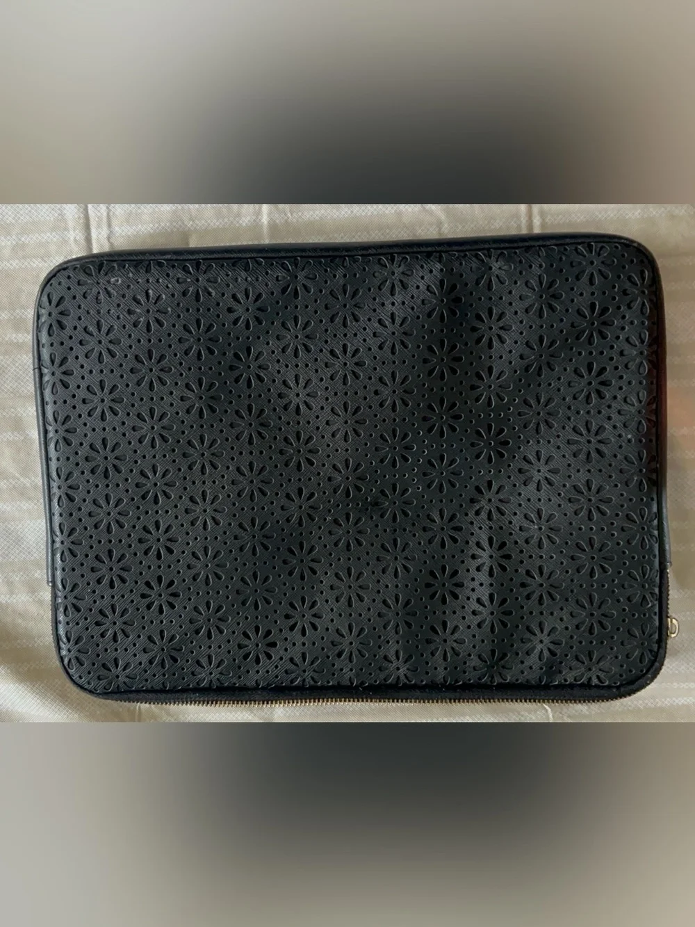 Kate Spade black perforated floral laptop sleeve for 13-inch devices